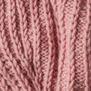 Close-up of pink knitted fabric texture