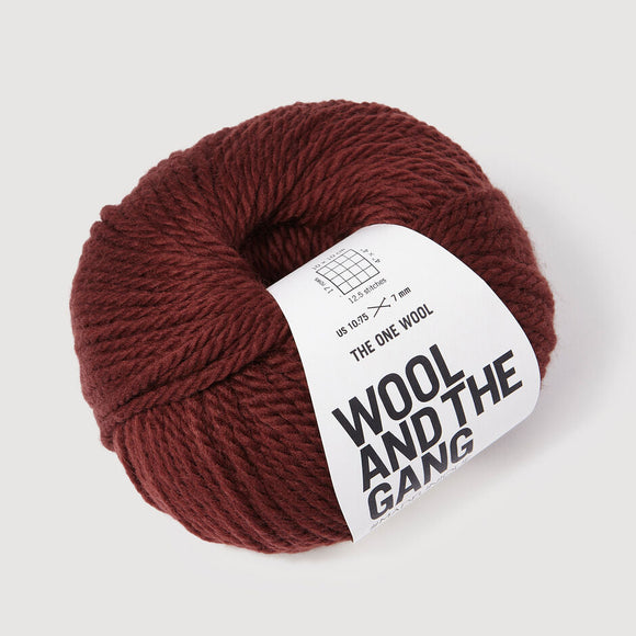 Ball of yarn with 'Wool and the Gang' label on a light gray background