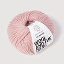 Pink yarn ball with 'Wool and the Gang' label on a white background