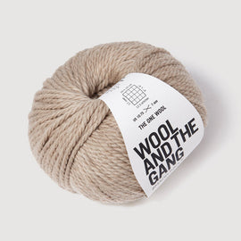 Ball of yarn with 'Wool and the Gang' label on a light background