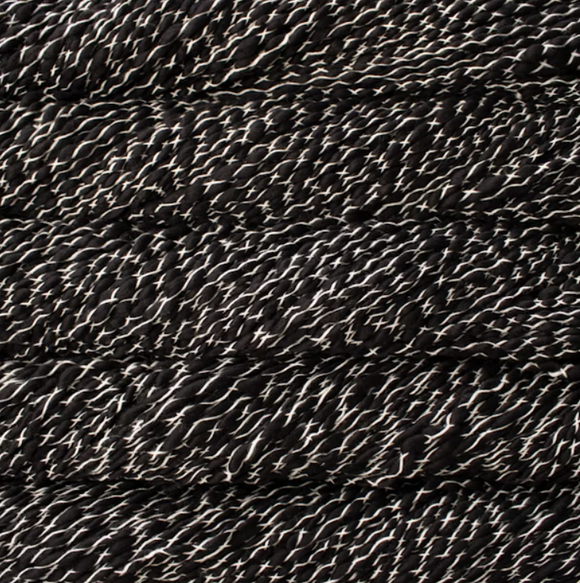 Malabrigo Caracol - Natural on Black