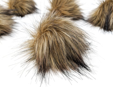 Brown faux fur pom pom.  Long pile fake fur fabric pom pom.