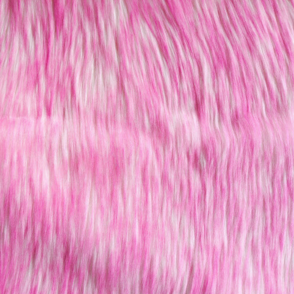 Long pile bubblegum faux fur fabric laid flat.  Bubblegum has a white base with pink tips.