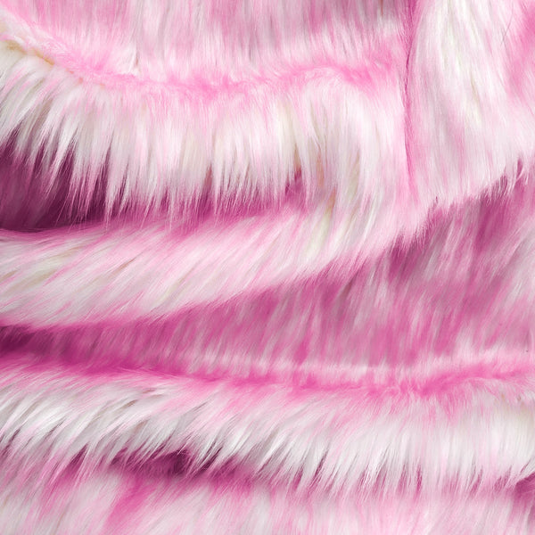Bubblegum faux fur fabric folded.  White base wit h pink tips long pile fake fur fabric.