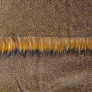 Backing of chestnut faux fur fabric showing the long pile length of the fake fur.