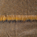 Backing of chestnut faux fur fabric showing the long pile length of the fake fur.