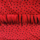 Backing of fire red faux fur fabric showing the long pile length of the fake fur.