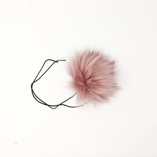 Rose blush faux fur pom pom with a thick nylon string.