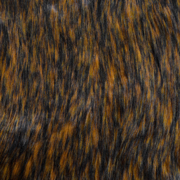 Long pile toffee brown faux fur fabric laid flat.